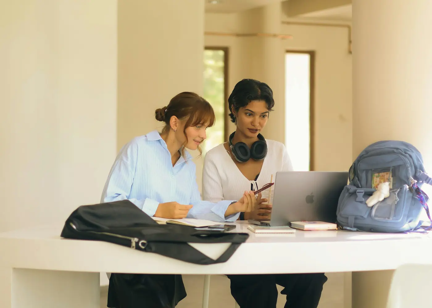 Two students studying at a table